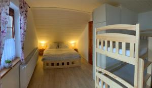 Postel nebo postele na pokoji v ubytování Apartmany215