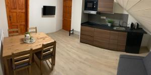 Kuchyň nebo kuchyňský kout v ubytování Apartmany215