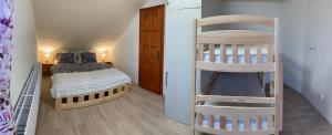 Postel nebo postele na pokoji v ubytování Apartmany215