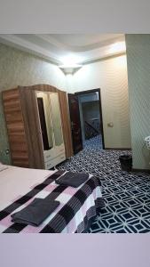 Postel nebo postele na pokoji v ubytování Ekm Hotel