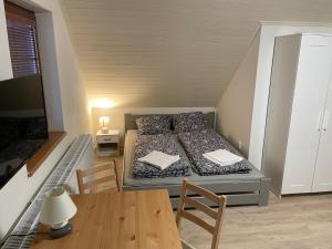 Postel nebo postele na pokoji v ubytování Apartmany215