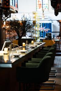 Restaurace v ubytování Boutiquehotel The Church + 41 fotografií