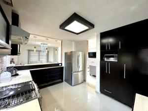 Kuchyň nebo kuchyňský kout v ubytování OLIVOS 33 Casa 3 habitaciones 3 piscinas