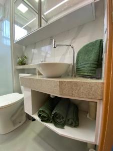 Et badeværelse på Apartamento com ar condicionado no Bairro Cabral