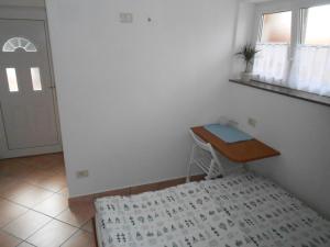 Postel nebo postele na pokoji v ubytování Love 2 Solkan