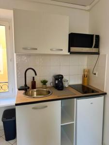 Kuchyň nebo kuchyňský kout v ubytování Petit Studio - Vieux Menton