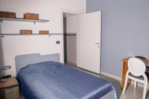 Postel nebo postele na pokoji v ubytování Appartamento Irina Peschiera del Garda