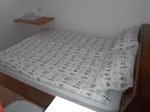 Postel nebo postele na pokoji v ubytování Love 2 Solkan