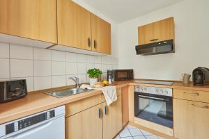 Η κουζίνα ή μικρή κουζίνα στο Nicole, schönes Apartment in Pforzheim +10 φωτογραφίες