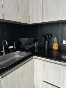 Kuchyň nebo kuchyňský kout v ubytování 203 Apartamento Frente al Mar