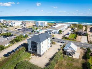 an aerial view of a building next to the beach at CR102 - Sea 'n Ski in Kill Devil Hills