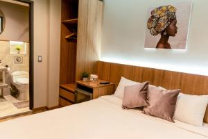 Uma cama ou camas num quarto em SkyHub