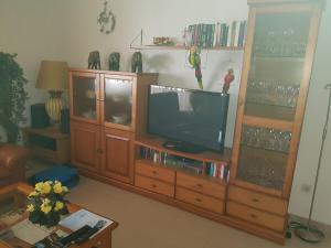 TV a/nebo společenská místnost v ubytování Belvilla by OYO Cascadas de la Marina + 23 fotografií