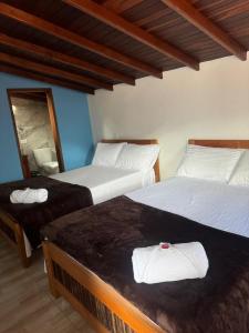 Postel nebo postele na pokoji v ubytování Hotel Macao + 20 fotografií