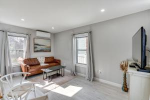 a living room with a couch and a table at Entire Private Home 2BR 2BTH Quite Area with parking in Lynn