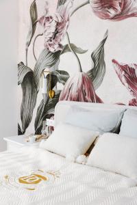 Voodi või voodid majutusasutuse Domus Carmeli Chic Appartments Powiśle toas