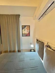 Postel nebo postele na pokoji v ubytování CAMPARY Casa Vacanze