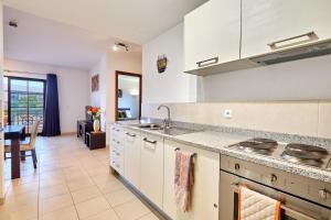 Kuchyň nebo kuchyňský kout v ubytování Tortuga 444