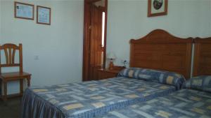 Cama o camas de una habitación en Hotel Luz de Guadiana