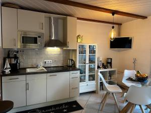 Kuchyň nebo kuchyňský kout v ubytování Hinrichsdorf 12