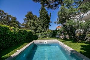 a swimming pool in the backyard of a house at Cascais Villa - private pool in Cascais