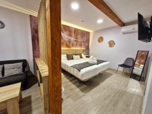 Postel nebo postele na pokoji v ubytování Feeling Home - Suites&Rooms