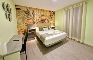 Postel nebo postele na pokoji v ubytování Feeling Home - Suites&Rooms