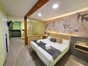 Postel nebo postele na pokoji v ubytování Feeling Home - Suites&Rooms