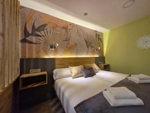 Postel nebo postele na pokoji v ubytování Feeling Home - Suites&Rooms