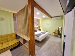 Postel nebo postele na pokoji v ubytování Feeling Home - Suites&Rooms
