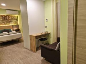 Postel nebo postele na pokoji v ubytování Feeling Home - Suites&Rooms
