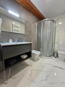 Koupelna v ubytování Feeling Home - Suites&Rooms