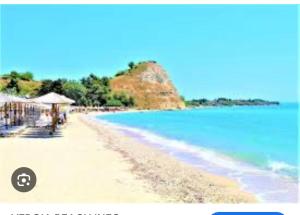 a view of a beach with blue water at Seaside Apartment in Vergia in Vergia