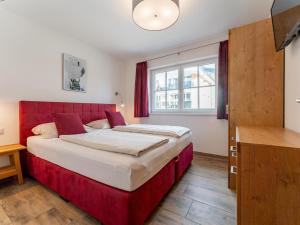 Postel nebo postele na pokoji v ubytování Tauern Suites Mitterwirt TOP 211