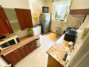 A cozinha ou cozinha compacta de Hostal Boonen