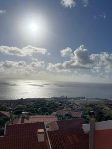 a view of the ocean from the roof of a building at Marilu!! in Madeira Cristiano Ronaldo Airport