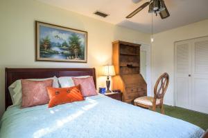 Postel nebo postele na pokoji v ubytování Oasis1080 Resort