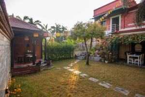 Giardino di Hotel Ananda Inn