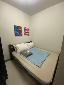 Photo de la galerie de l'établissement Cozy home stay at S residences Moa, à Manille