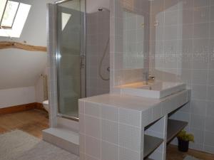 a bathroom with a sink and a shower at Moulin atypique du XVème siècle avec jardin clos - FR-1-381-483 in Arpheuilles +28 photos