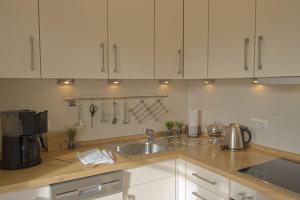 Η κουζίνα ή μικρή κουζίνα στο Das-SonnenDECK +4 φωτογραφίες