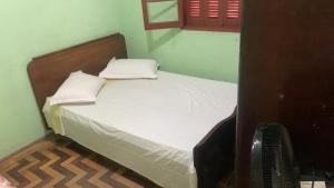 Postel nebo postele na pokoji v ubytování Casa com 1 dormitório em São Gabriel