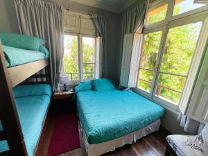 Cama ou camas em um quarto em Hostal Boonen