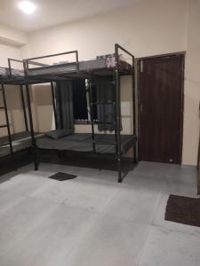 Koja eða kojur í herbergi á Satvik Stays