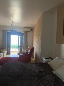 Ένα ή περισσότερα κρεβάτια σε δωμάτιο στο Casa no centro para 8 pessoas