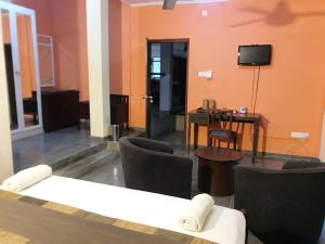 TV a/nebo společenská místnost v ubytování Nature Resort Layathraa
