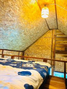 Postel nebo postele na pokoji v ubytování Rakkhao Inthanon Homestay รักเขาอินทนนท์โฮมสเตย์