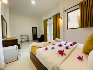 Letto o letti in una camera di Heaven Breeze