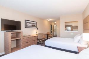 Katil atau katil-katil dalam bilik di Sandman Hotel Cranbrook