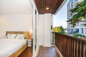 Ένα ή περισσότερα κρεβάτια σε δωμάτιο στο Villa Nirvana, Hua Hin +63 φωτογραφίες